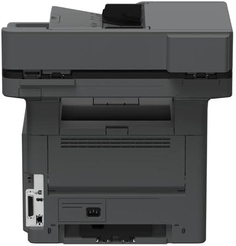 Vista posteriore della stampante multifunzione Lexmark MX521de con porte di connessione e alimentazione per rete e periferiche. Vista posteriore della stampante multifunzione Lexmark MX521de con porte di connessione e alimentazione per rete e periferiche.